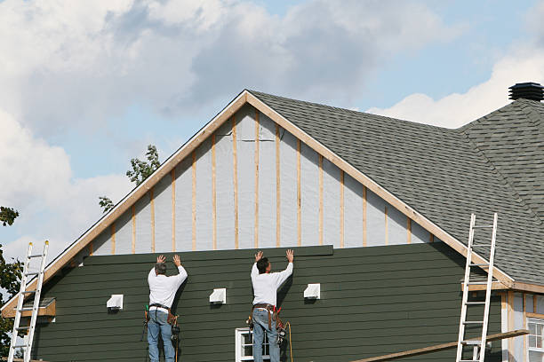 Professional Siding Repair technician working in North Andover, MA
